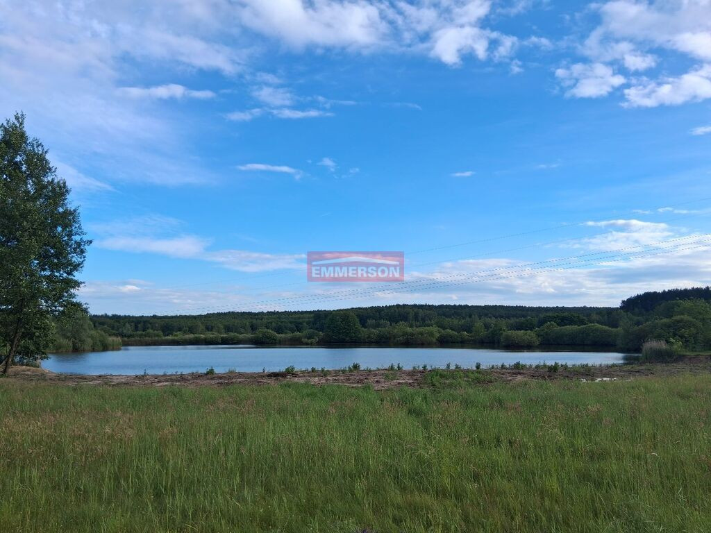 Piękna działka z własnym jeziorem i prywatną plażą - Więcej