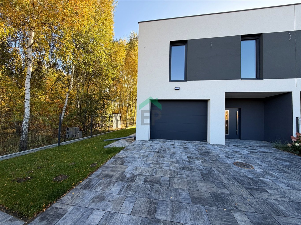 NOWOCZESNY DOM W ZABUDOWIE BLIŹNIACZEJ 183 m²