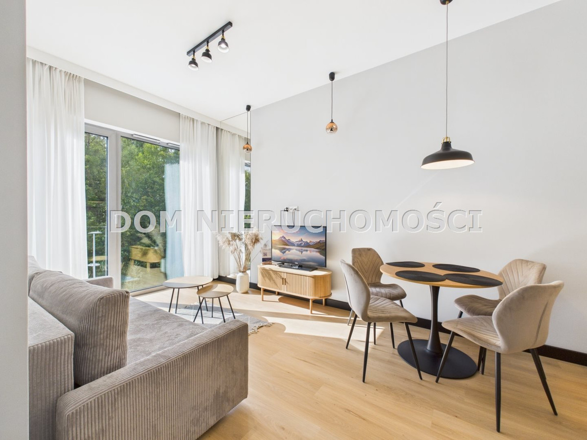 Mieszkanie nad jeziorem w nowym apartamentowcu