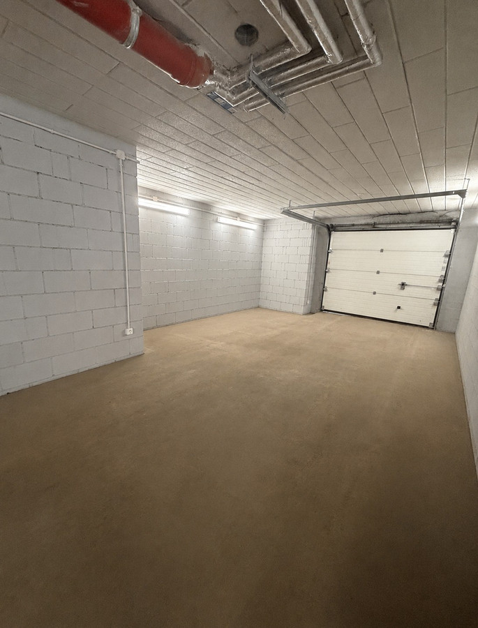 Sprzedam garaż w budynku mieszkalnym o pow. 46,67 m² w centrum Ostródy - Widok 3